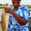 Latershia Martel of Houston caught this nice 21inch slot red on cut bait
