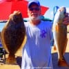 Shelby Camp of Thicket TX nabbed this nice flounder and red while fishing finger mullet