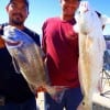 Fishin buds Jessie Gomez and Al Lopez of Spring TX show off their nice drum and slot red they took on shrimp