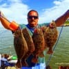 HAIL TO THE KING Port Bolivar TX angler Don Kernan seems to be praising after taking this limit of flounder on Gulp