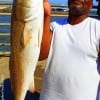 Kent Herring of Houston fished shrimp to latch on to this HUGE 38inch tagger bull red