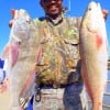 Lawrence Loving of Crosby TX caught this 28inch red and 22inch drum on shrimp