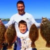 Robert and Brady Murphy of Batson TX gulped up these four flounder for supper