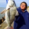 Cindy Hinkle of Gilchrist TX landed this nice 21 inch keeper eater drum on shrimp