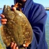 Shelia Peterson of Huntsville TX nabbed this nice18 inch flounder on mud minnows