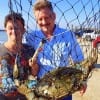 Father and son anglers Ryan and Kenny Hammond of Spring TX net a Crab supper for tonight