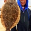 David Mendoza of Spring TX floated a live finger mullet to catch this nice keeper flounder