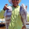 James Henry of Houston took these two nice slot drum he caught on live shrimp