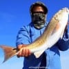 Jorge Escobar of Houston fished a finger mullet to nab this nice 25 inch slot red