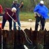 Lady angler comes to the aid of Bertolino to net his 4LB trophy