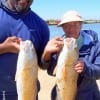 Neoma Smith and Ralph Spiller teamed up to catch these nice slot reds while fishing soft plastics