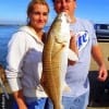 The fishing team of Jason and Bobbi Garby of Crystal Beach TX nabbed this nice slot red he took on a fnger mullet