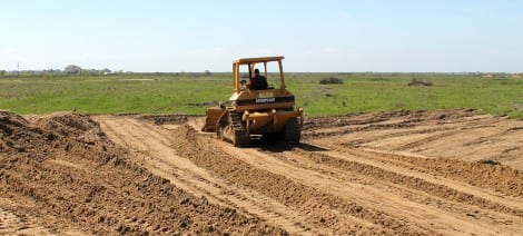 The grounds are being leveled and groomed in preparation for the big Memorial Day crowd.