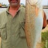 Bennie Mongonia of The Woodlands Tx took this 24inch slot red on peeled shrimp