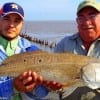 Fishin amigos Juan Guzman and Guestavo Meza of Houston teamed up to catch this 31inch tagger bull red Meza took on a finger mullet