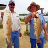 Fishin buds Lucas Alegre and Gary Tolbert of Lufkin TX took these nice slot reds on shrimp