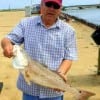 Fishing with shrimp put this nice slot red in the hands of James Carter of College Station TX