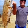 Shelby Camp of Thicket TX wrangled up this nice slot red on a finger mullet