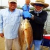 The Edralins teamed up to catch these nice slot reds on figer mullet