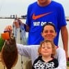 The Wooley Family of Beaumont show off their nice flounder caught on live shad