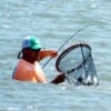 Surf wader landing a good speck