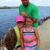 The Chamlin Family gives a thumbs up for mom's nice flounder she caught on a finger mullet