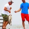 Two Rollover Trout Wranglers admiring this anglers mess of trout he took on plastic