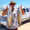 Two nice trout on the 9am tide change for High Islander Jackie Bertolino while fishing a mirrOlure