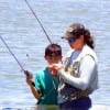 Wader Mom teaching her son the tricks to wade-fishing