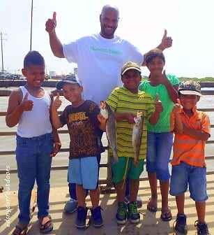 The Nichols Territory Fishing Krewe of Houston heft their nice specks caught on soft plastics