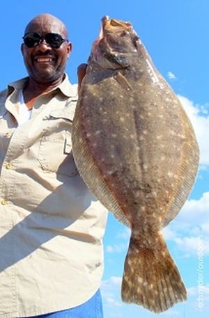 Charles Brown of Missouri City TX fished a finger mullet to catch this 20inch Rollover Hallibut