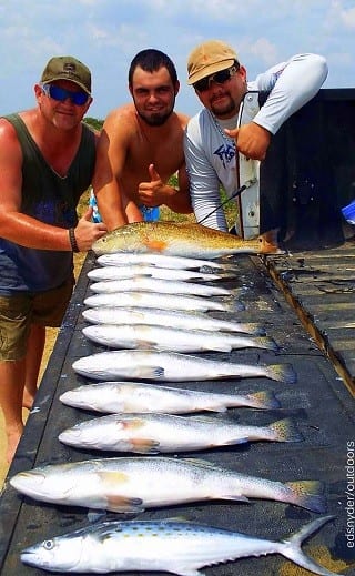 Fishin buds Don Graham, Tyler Grisham, and Chase Lee night-fished with shad to catch trout, reds, and a smack between midnight and 1am