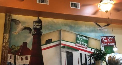 Large wall mural reminding everyone of Mama Teresa's Bolivar heritage