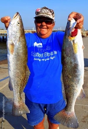 Poochie Walker of League City TX nabbed these two nice trout fishing with finger mullet