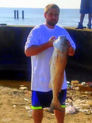 Chris Zych of Cypress TX caught and released this 40plus inch tagger bull red