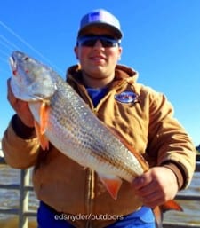 Ethan Carrasco of Pasadena TX took this nice 26inch slot red on shrimp