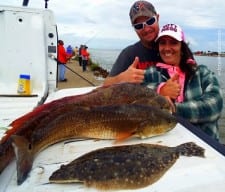 Night-Shift anglers Andy and Carla Blank of Dayton TX took these nice reds and flounder on live croaker and shrimp