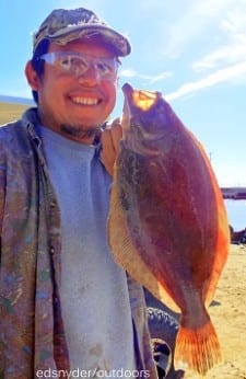 Winnie TX angler Francisco Hernandez took this barely keeper flounder on berkely gulp