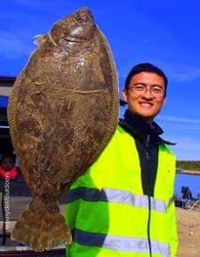 Pearland TX angler Simon Gao fished a berkely gulp for this nice 22inch doormat flounder