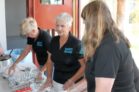 Keep Bolivar Beautiful and Adopt-A-Beach organizers greeting volunteers and serving lunch