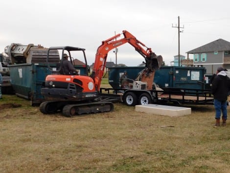 A steady flow of pickups, trailers, and cars brought all types of debris for dumping.