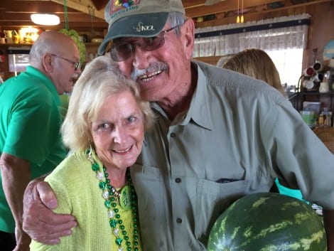 Patty Hagstrom greets former neighbor Jerry Parker (Note "green" watermelon)