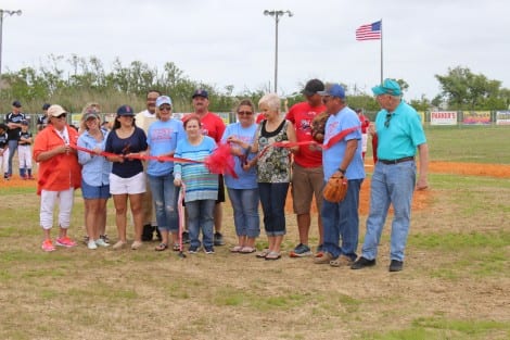 Leslie Lowe cutting the ribbon