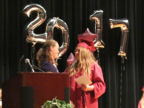Amy Millender Ray presenting the Terry Millender Memorial Scholarship to Reigh-Ann Landry